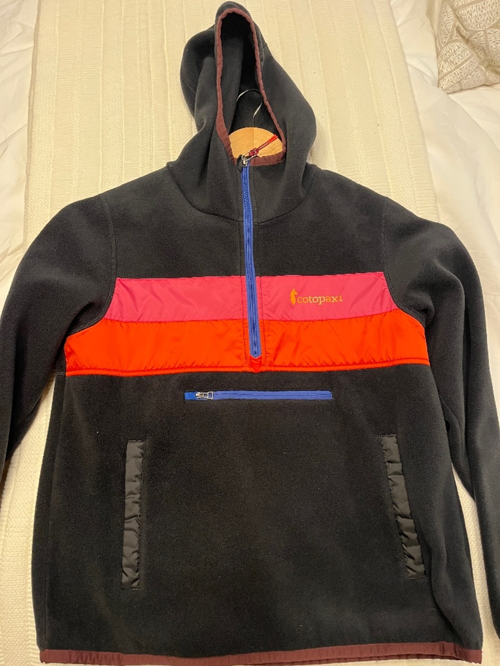 Cotopaxi fleece hoodie.